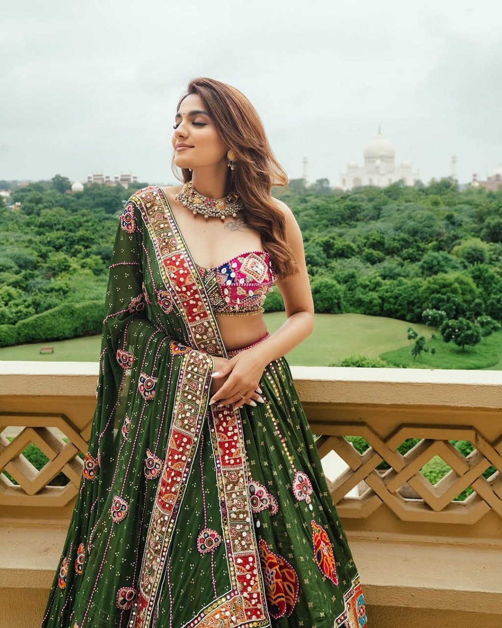 A Royal Look Multicolor Patchwork Dream on Olive Drapes Lehengha Choli