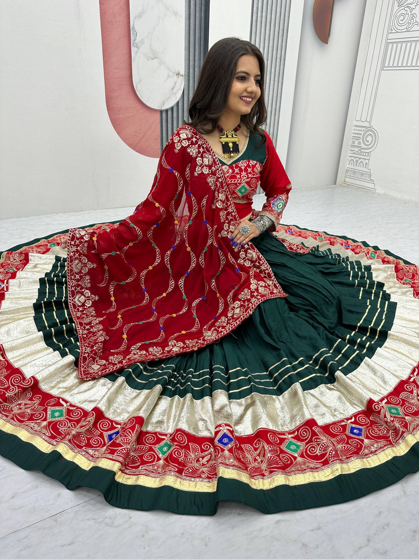 The Festival Muse Jewel Tones with Hand Embroidered Borders Navratri Lehenga Choli
