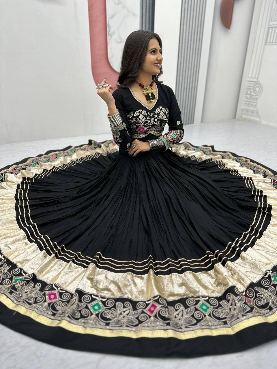 The Festival Muse Jewel Tones with Hand Embroidered Borders Navratri Lehenga Choli
