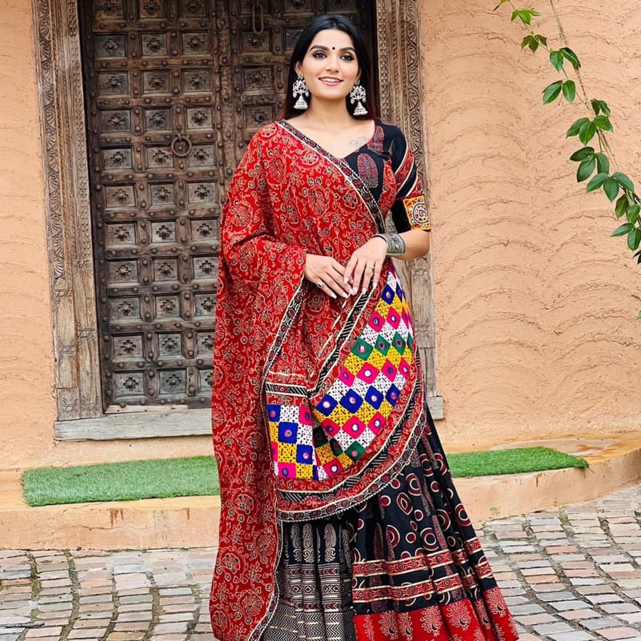 Royal Rajasthani Red & Black Mirrorwork Bandhani Drape Lehenga Choli