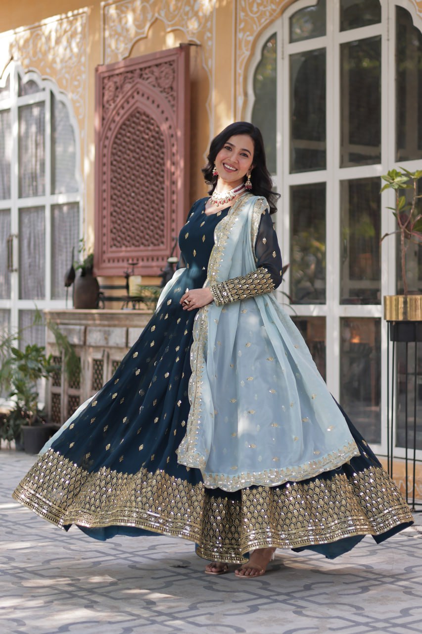 Golden Whispers on Midnight Blue A Regal Celebration of Cultural Beauty