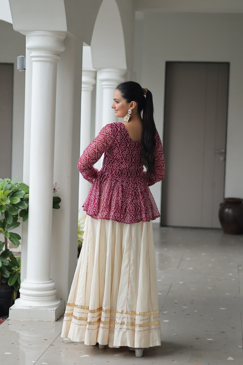 Festive Grace: Mirror-Work Peplum Top with Cream Flared Lehenga