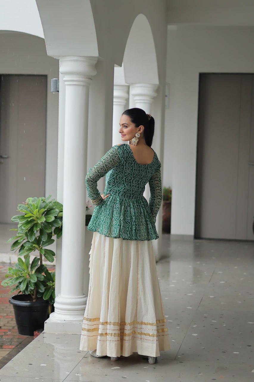Festive Grace: Mirror-Work Peplum Top with Cream Flared Lehenga