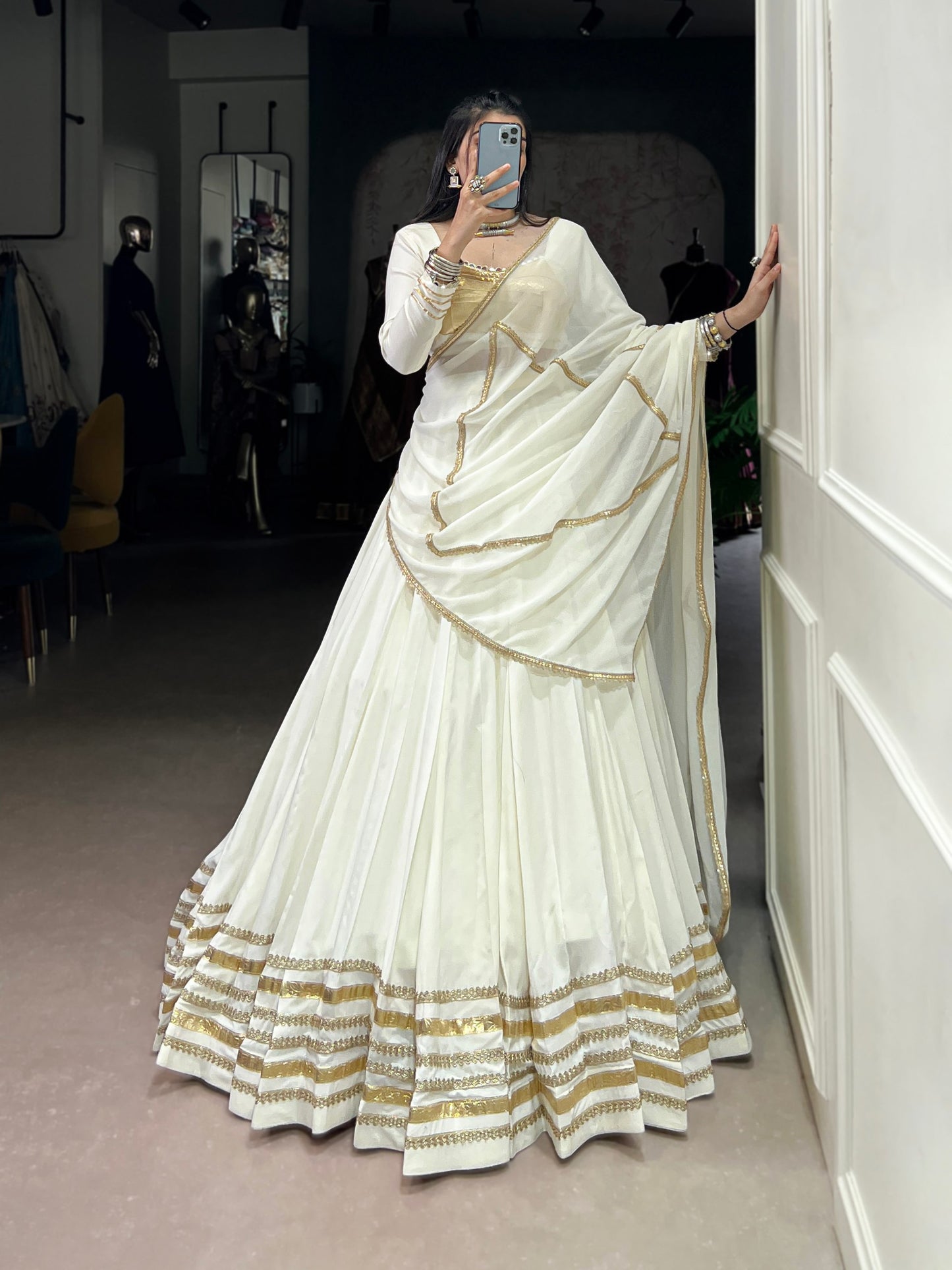 Rhea’s Ethereal Look White & Gold Flow Lehenga Set for Regal Evenings