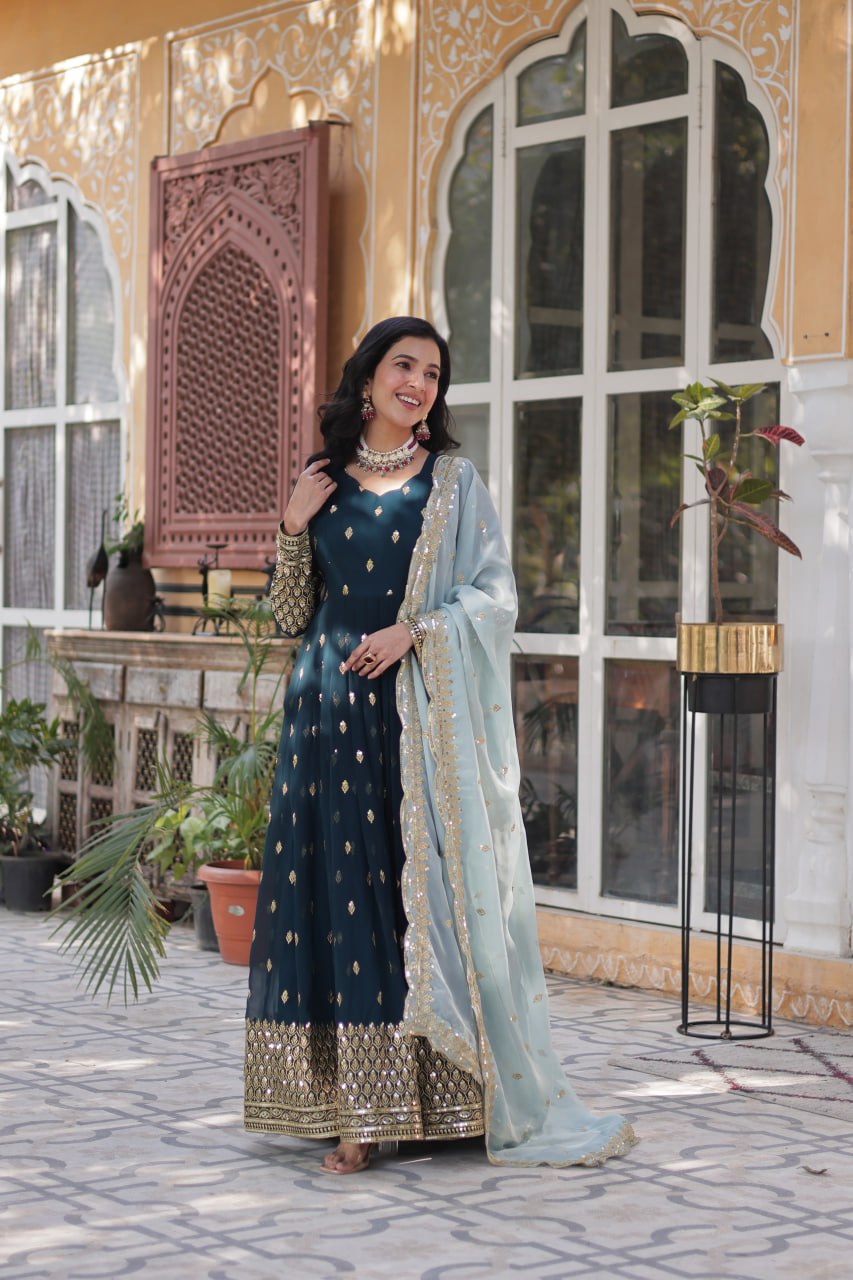 Golden Whispers on Midnight Blue A Regal Celebration of Cultural Beauty
