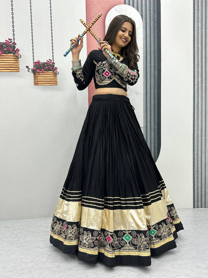 The Festival Muse Jewel Tones with Hand Embroidered Borders Navratri Lehenga Choli